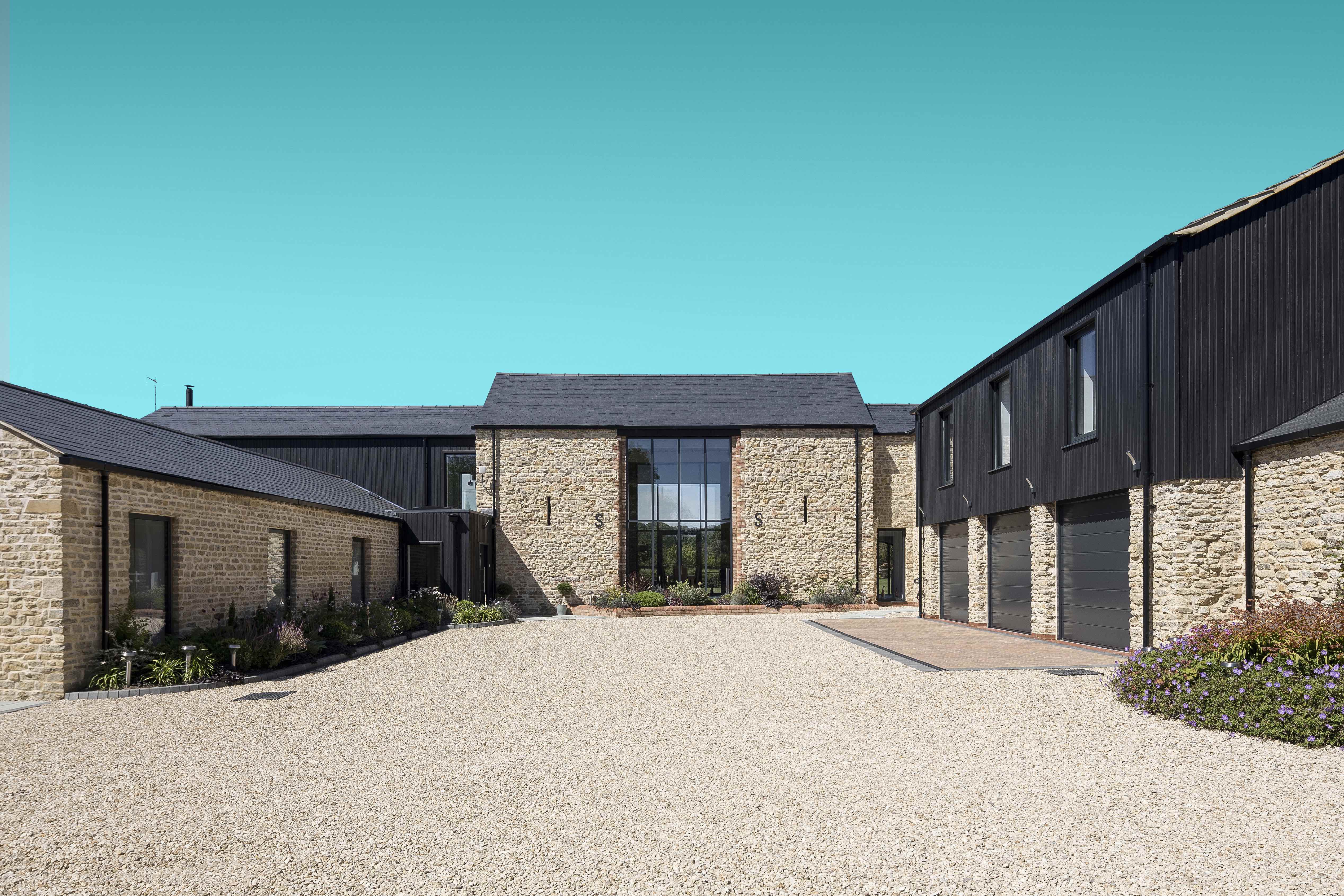 A courtyard at Puxley farm with XO Edge solar